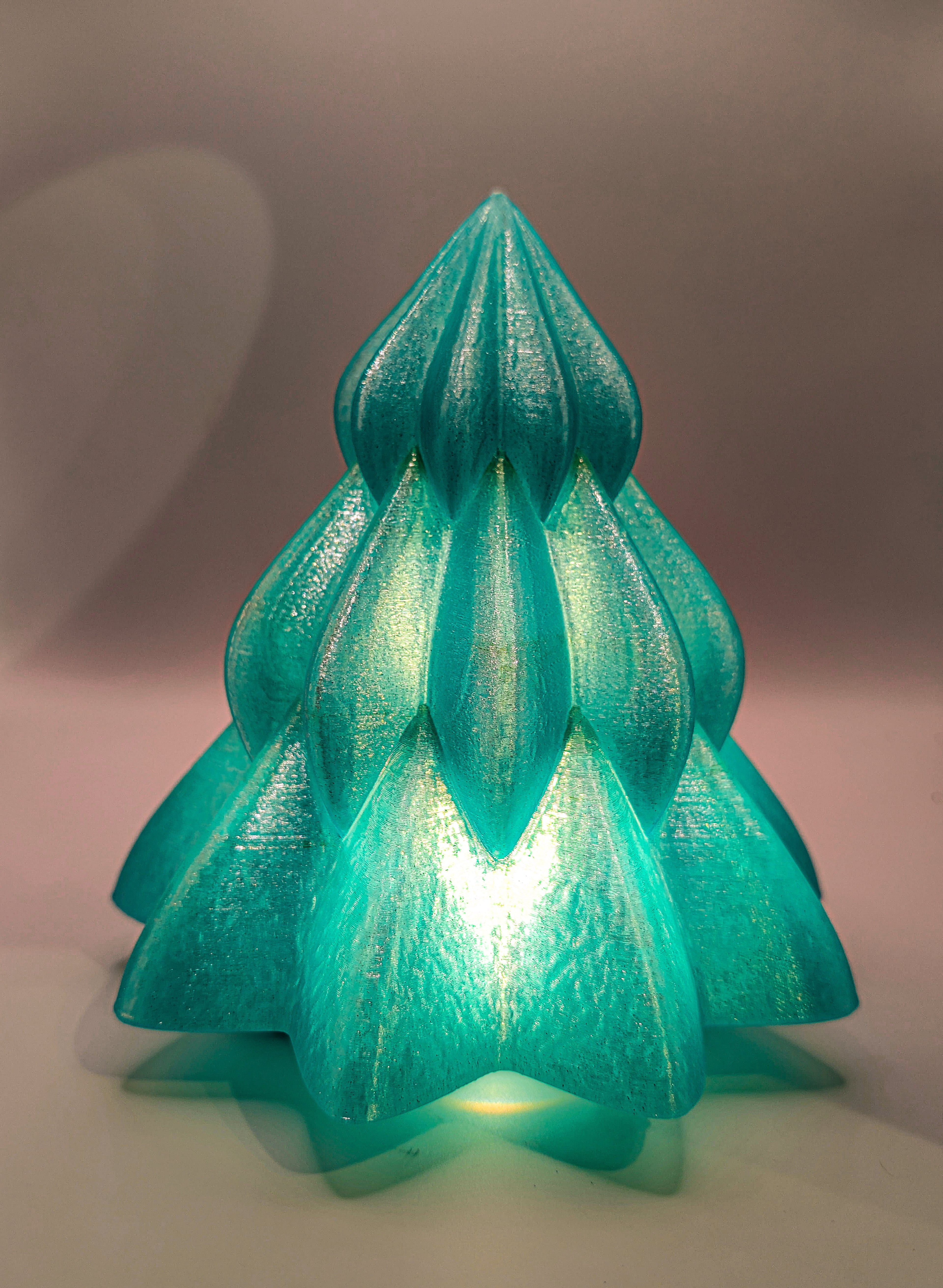 I printed this with the filament my wife picked, Cookiecad Teal Elixir and it turned out AMAZING!