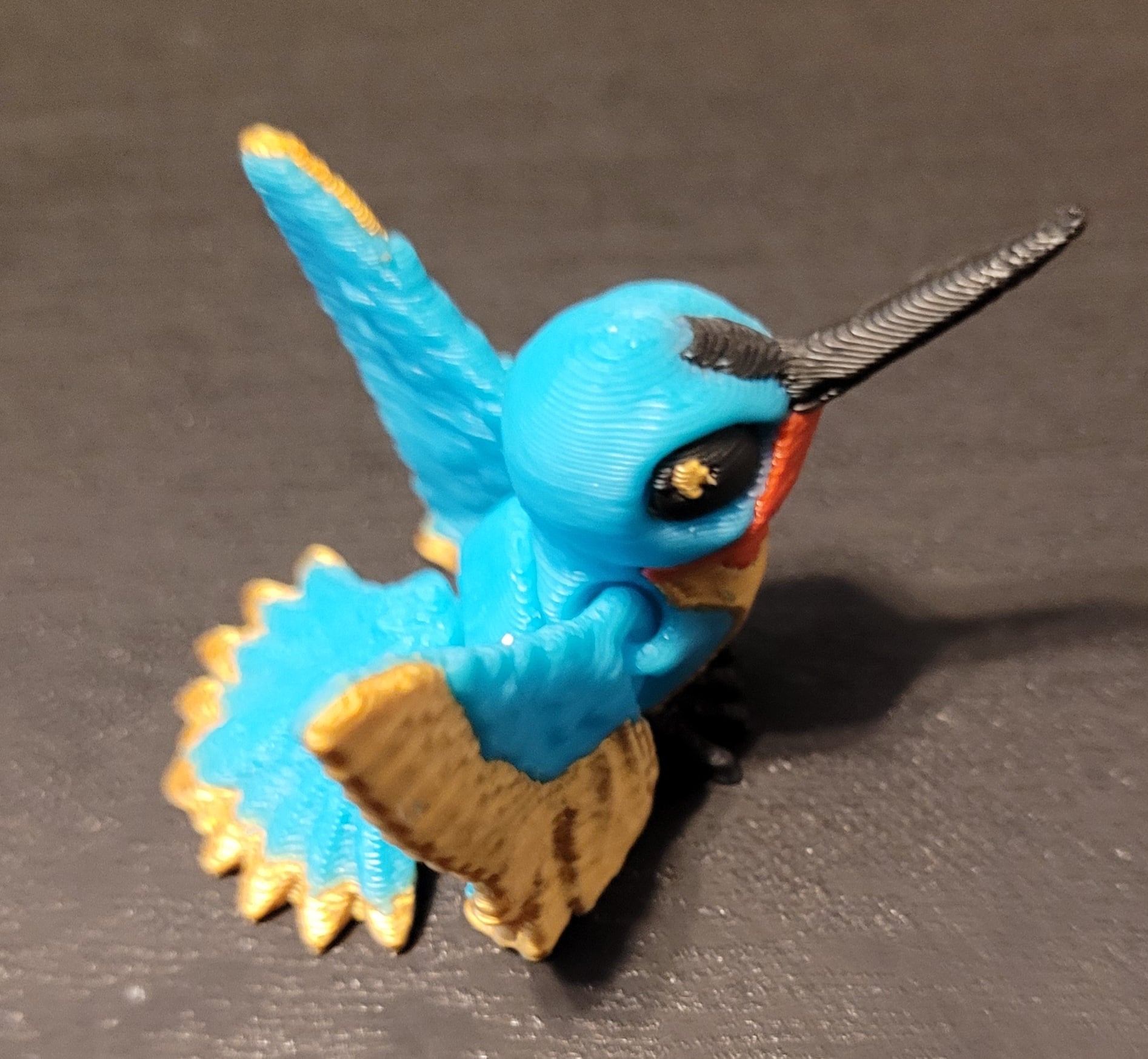 I had to start this twice due to printer issues. First batch came off plate. I put a brim on and they printed well. This one is probably around 25%. Takes a long time to print with all the colors, but looks great.