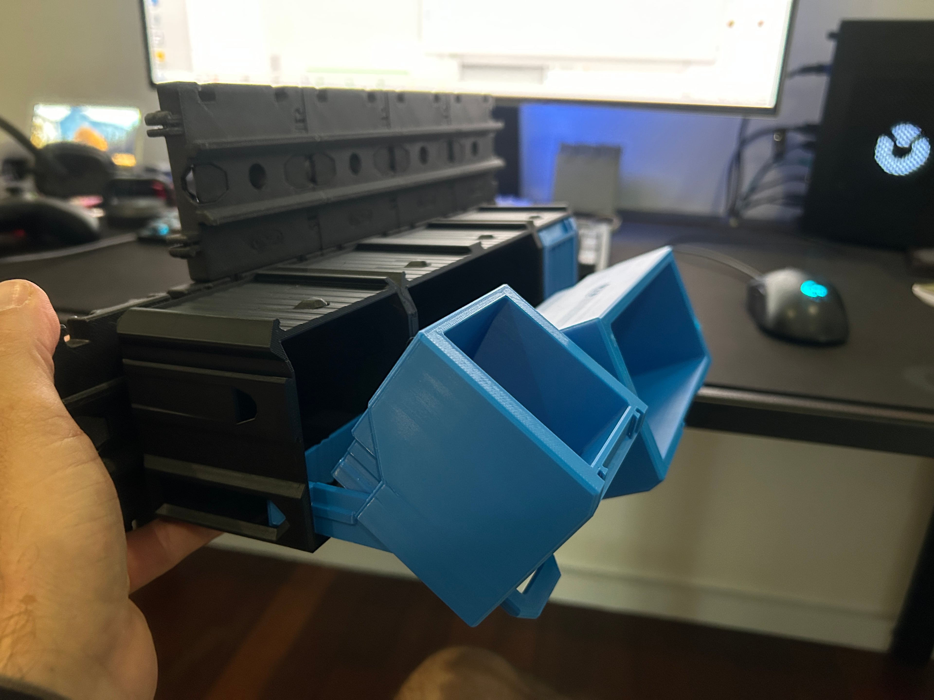 I’ve made my own adjustment to this model. This is a much better angle where the contents of the box dont fall out