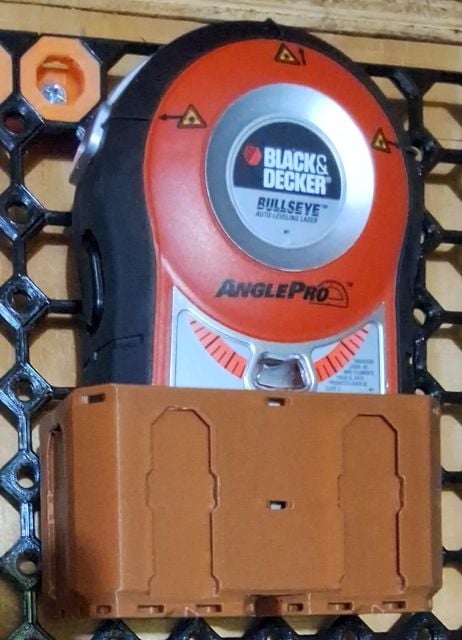 Laser level sitting in slightly-deepened bin