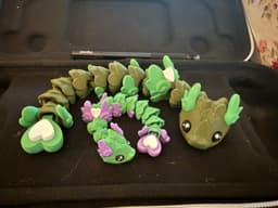 My kiddo has been eyeing flexi dragons, and I'm excited to surprise him with this.
Printed at 100% and 60% size! 3d model