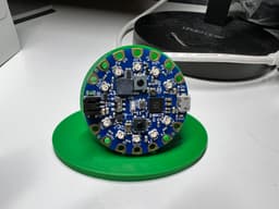 Circuit Playground Bluefruit Stand - The new v3 has standoffs allowing easy access to pads for soldering or alligator clips. - 3d model