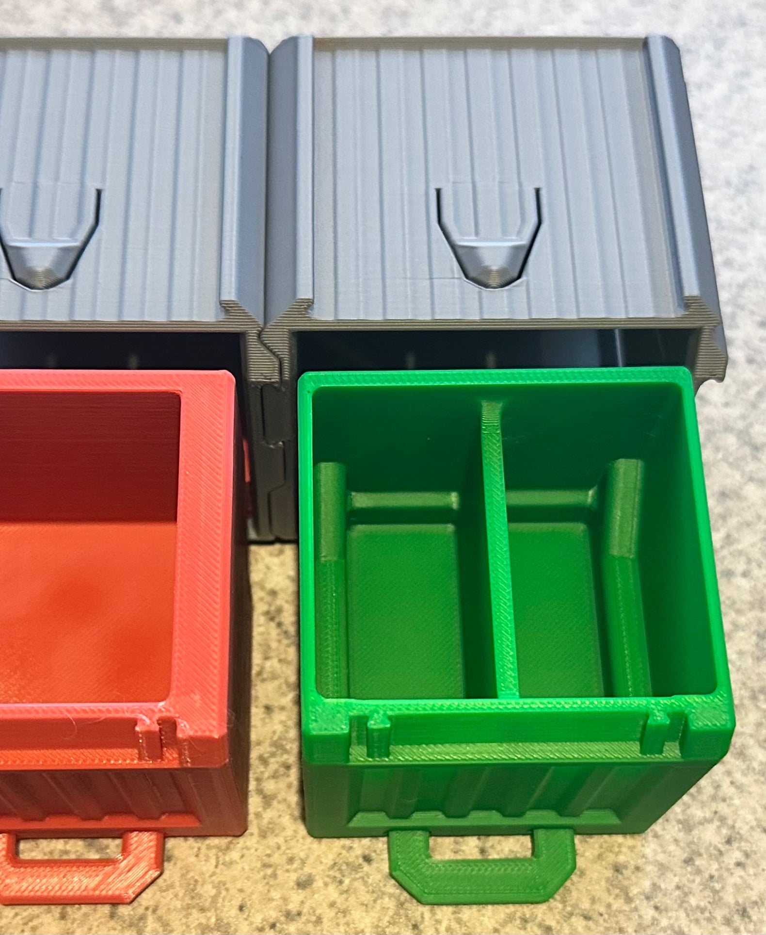 Increased internal volume by about 30% and added a fixed center divider. I'd probably reduce the opening angle when fully extended, but I have a few more pressing remixes in progress with this outstanding storage line.