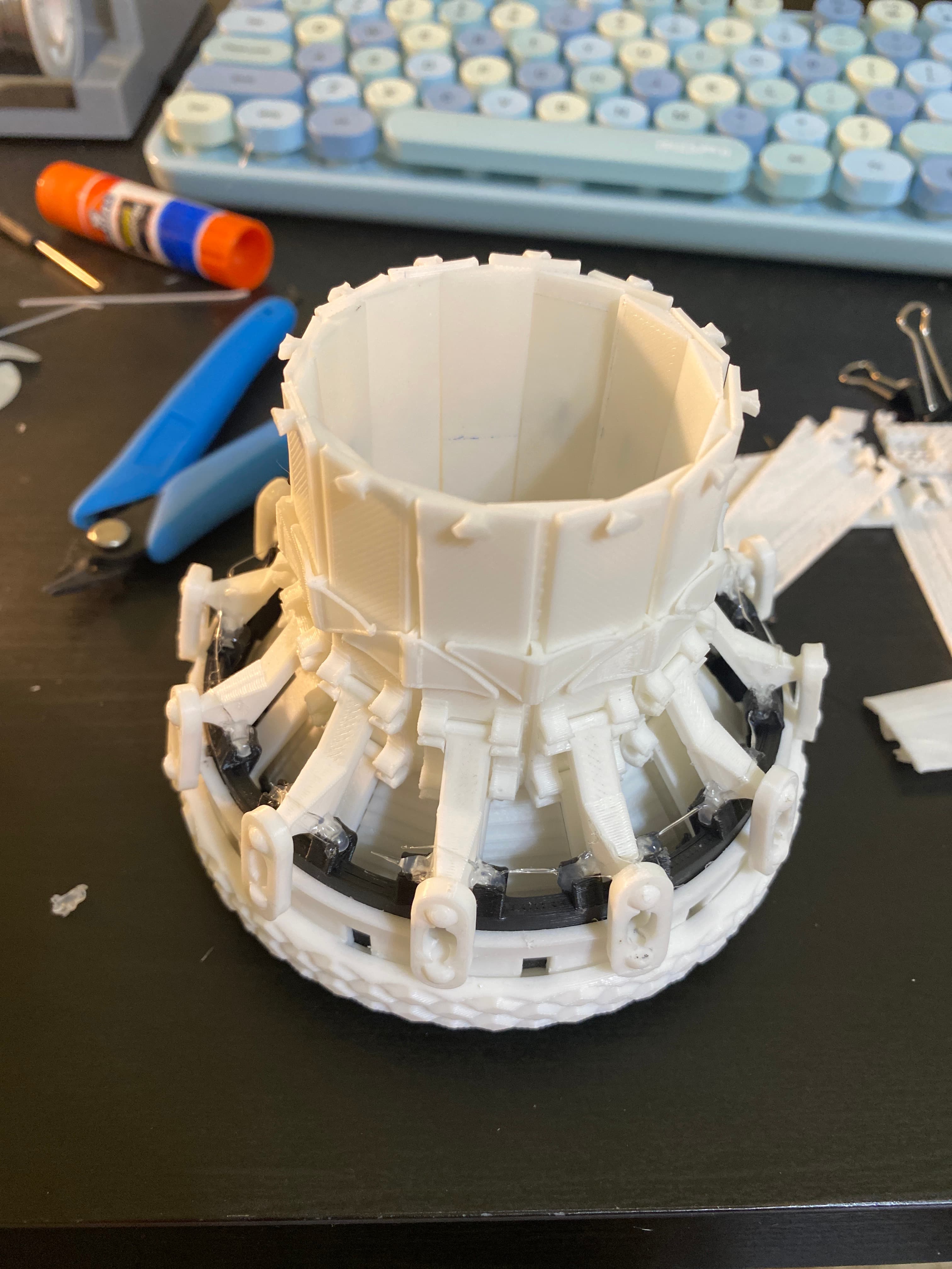 Assembly:0/10-Mostly my fault I should have printed it in higher quality I have to reprint the body.stl multiple times due to sockets snapping.
Model:10/10-Very cool model would have liked it to be a few less parts but then again it looks amazing
Note: I could not put the blade-C.stl on because I had to put hot glue on the sockets to prevent the links from slipping out.