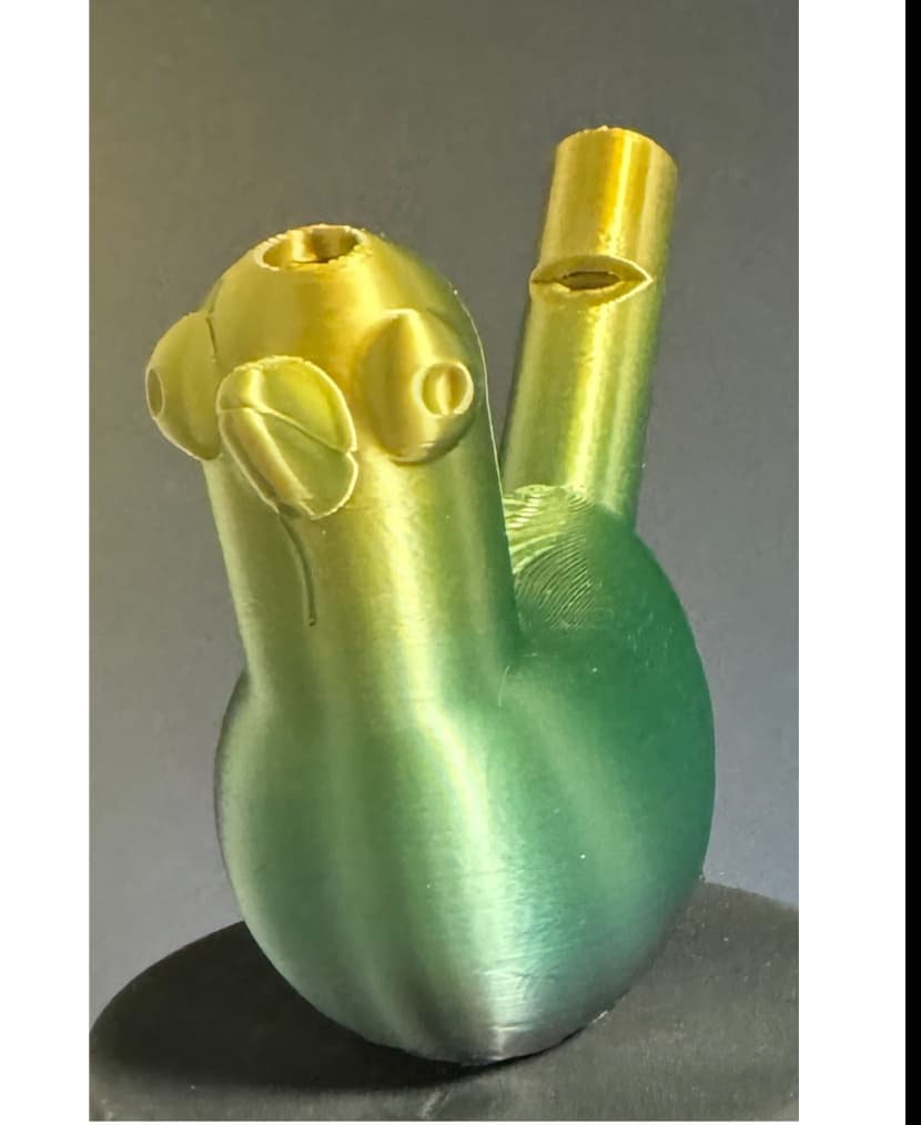 Printed on a Bambu P1S using TTYT3D `Silk Shiny Fast Color Gradient Change` PLA
