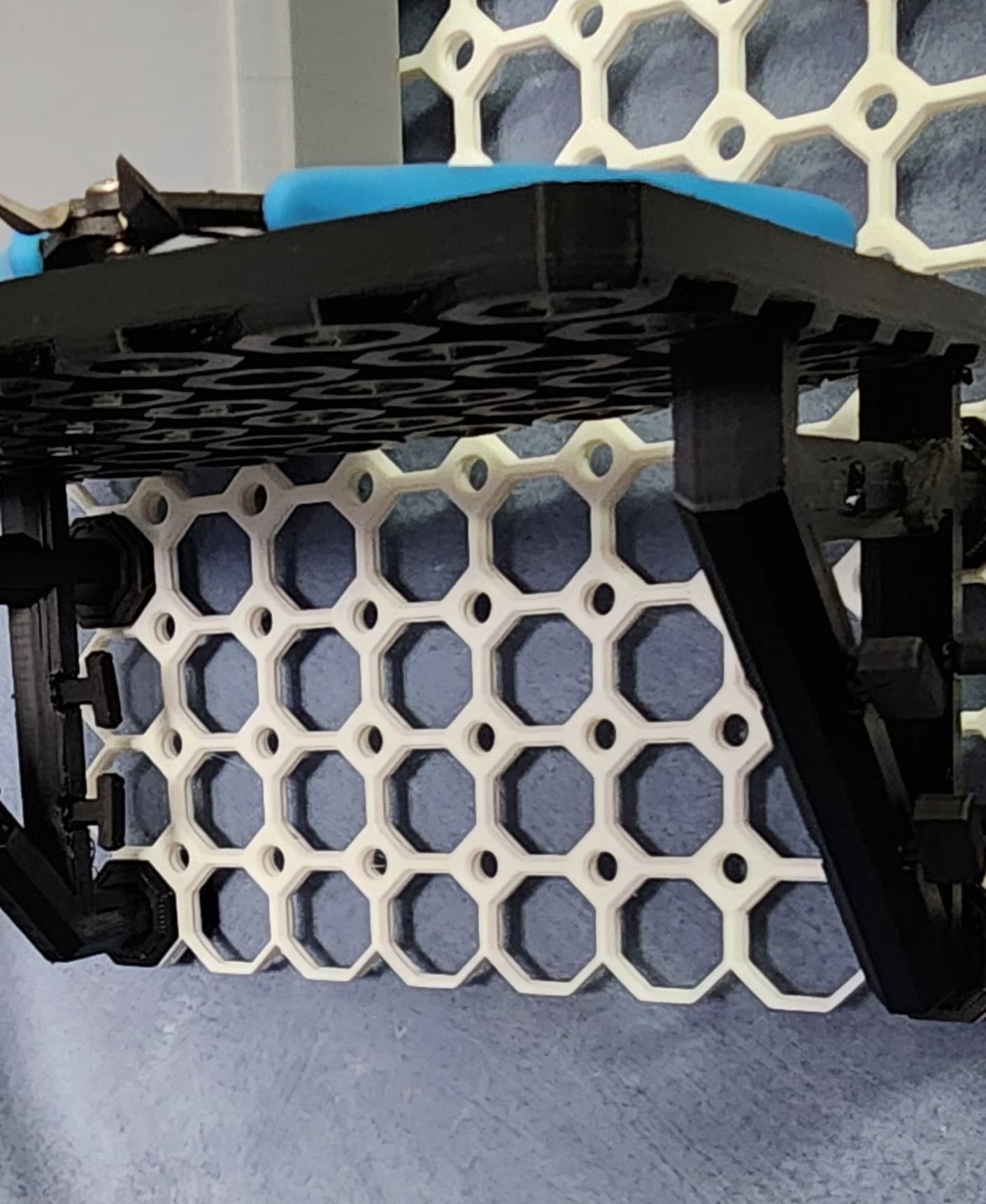 Push fit bracket, with small thread t Bolts and base plate, held by weight bearing directional snap at top