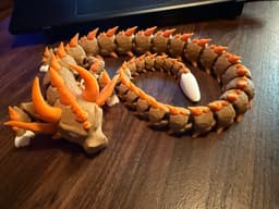 Another incredible print! I went with warm, fall-inspired colors, and it turned out fantastic. I realized after printing that his little ears move, which is such an amazing detail. I’m definitely planning to print the other dragons to add to my collection! 3d model