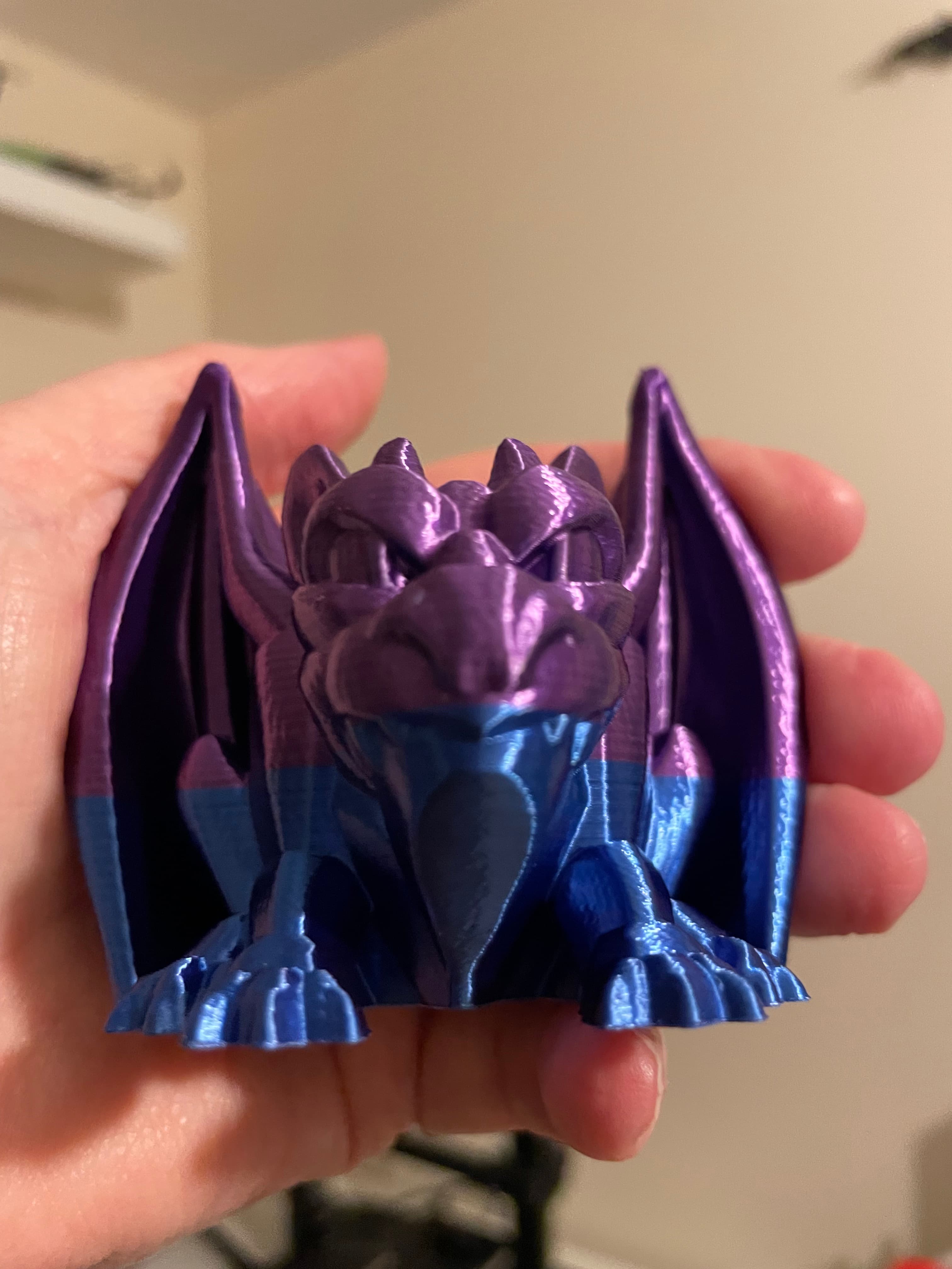 This came out amazing! I'm pretty new to 3D printing and been having real problems with my printer. Managed to sort it, and this is the first print after sorting. Ignore the colour change, the filament got a bit caught on the reel but I saw it in time, but it looks like the filament turned round :D
Anyway, excellent little project, he's going pride of place among my fave prints.