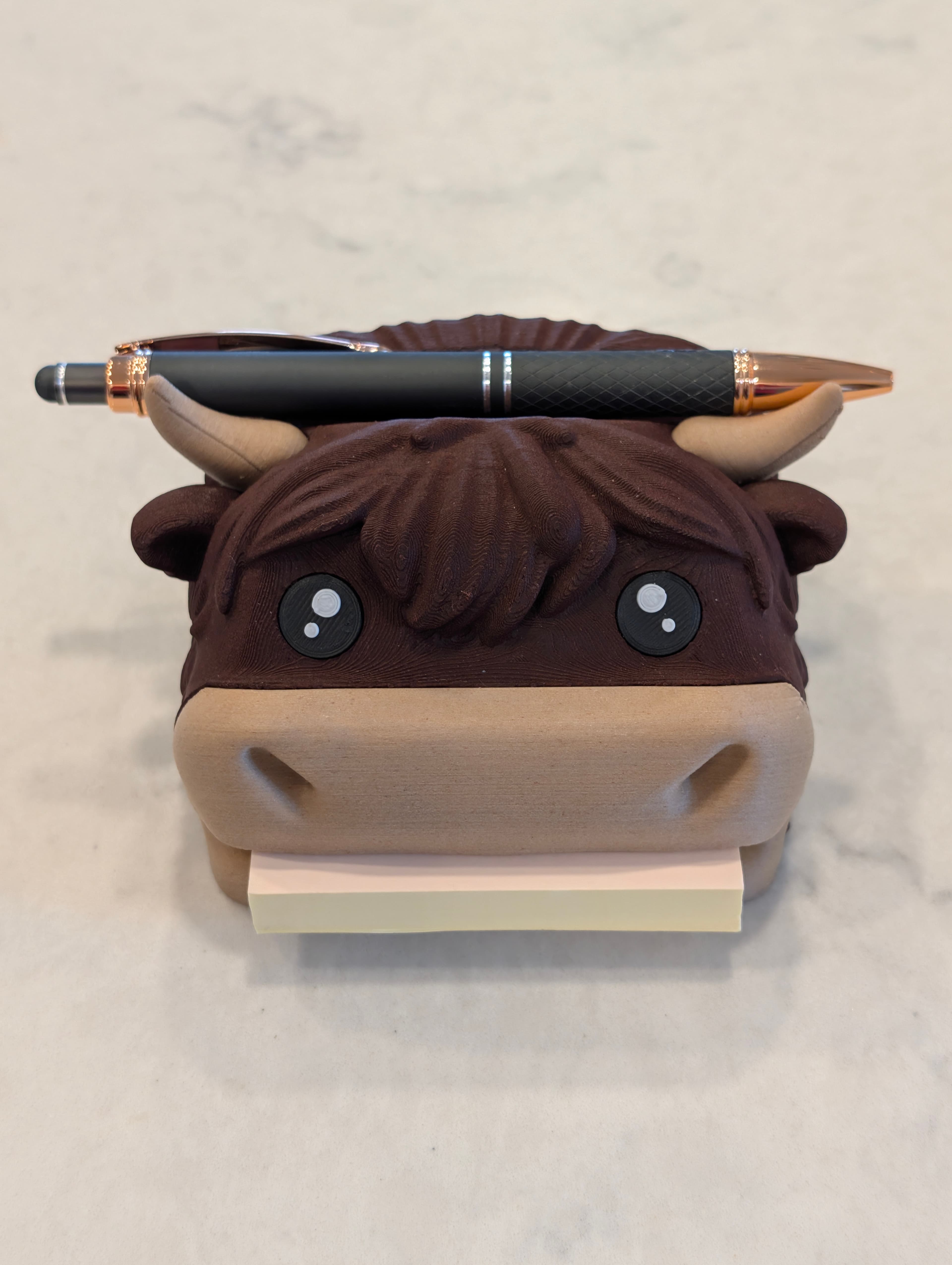 Very nice model! Printed with wood pulp filament on a Core One, had to modify the multi-color eyes to print on a single color printer, but they turned out well I think.