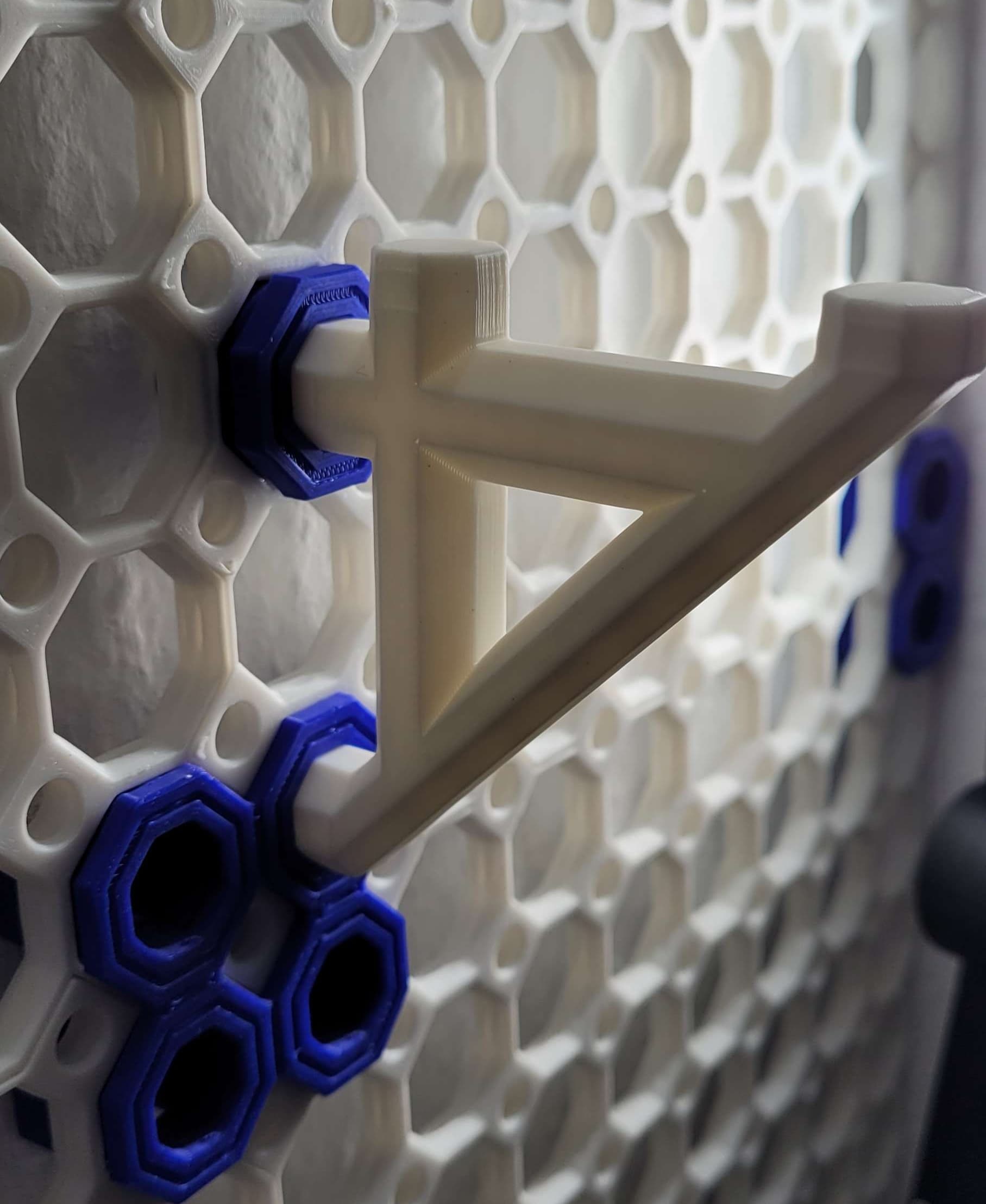 I used that bolt and a small screw to secure the shelf support, then simply screw in the whole assembly iinto the multiboard and pushfit the lower part. https://thangs.com/designer/Keep%20Making/3d-model/13%20mm%20Big%20Thread%2C%20Flat%20Push-Fit%20Head%2C%20Small%20Thread%20Hole%2C%20Bolt-973876