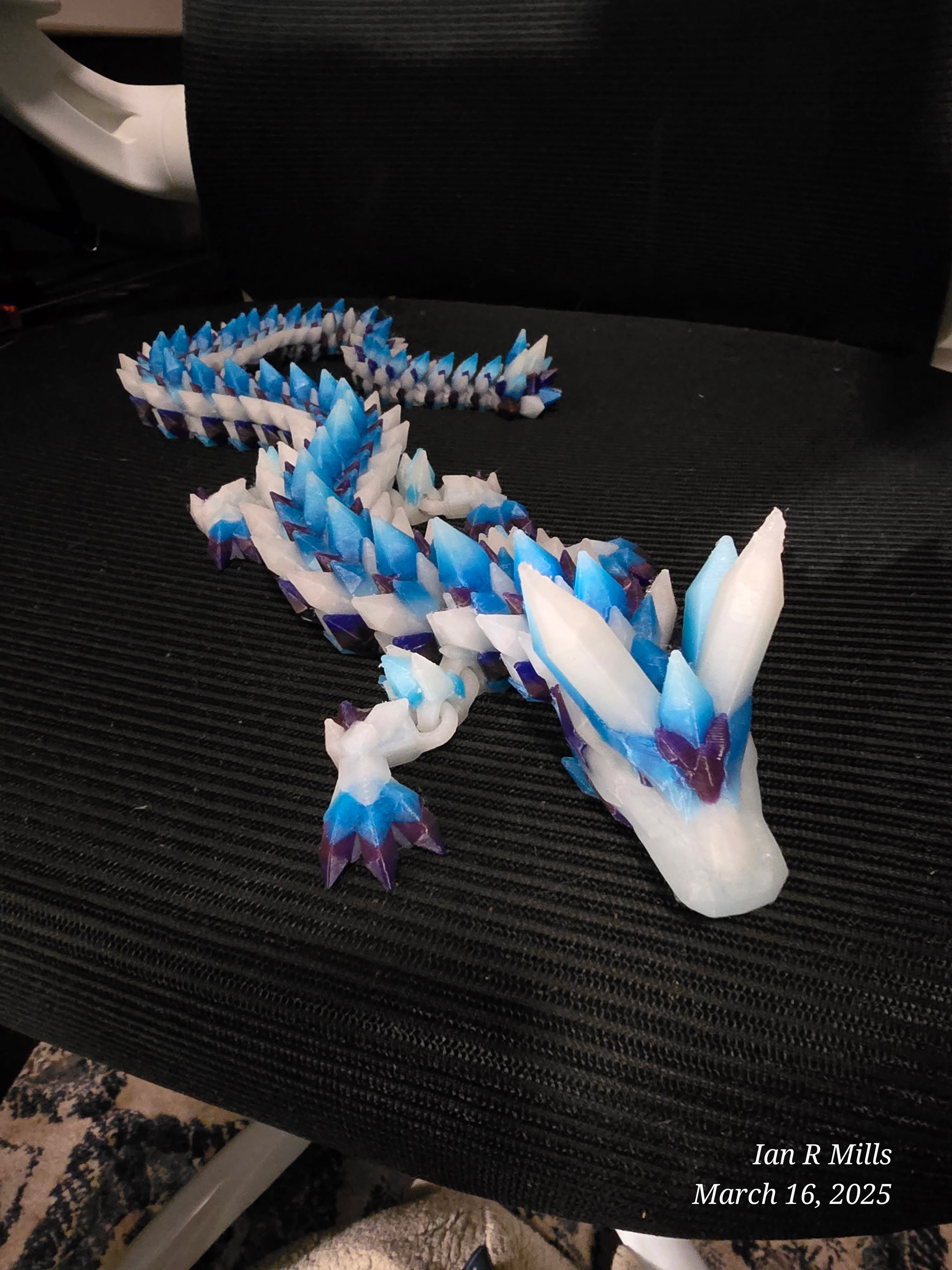 26.5 hour print and i am so pleased! Used 2 "crystal gradient" PLAs and 2 different PLA glows. Really ran with an Iridescent Frost Dragon vibe.