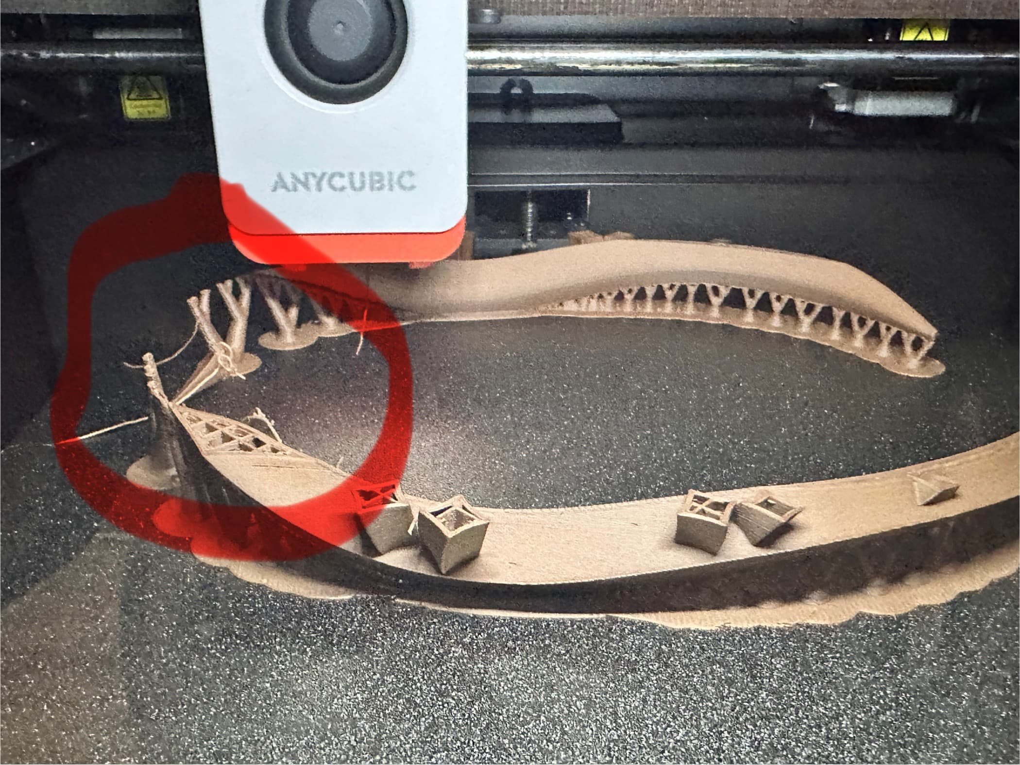 I'm having trouble printing the point at the bottom. I've tried 3 times, twice with wood PLA and once with standard black PLA. Do you have any tips on how to fix this?