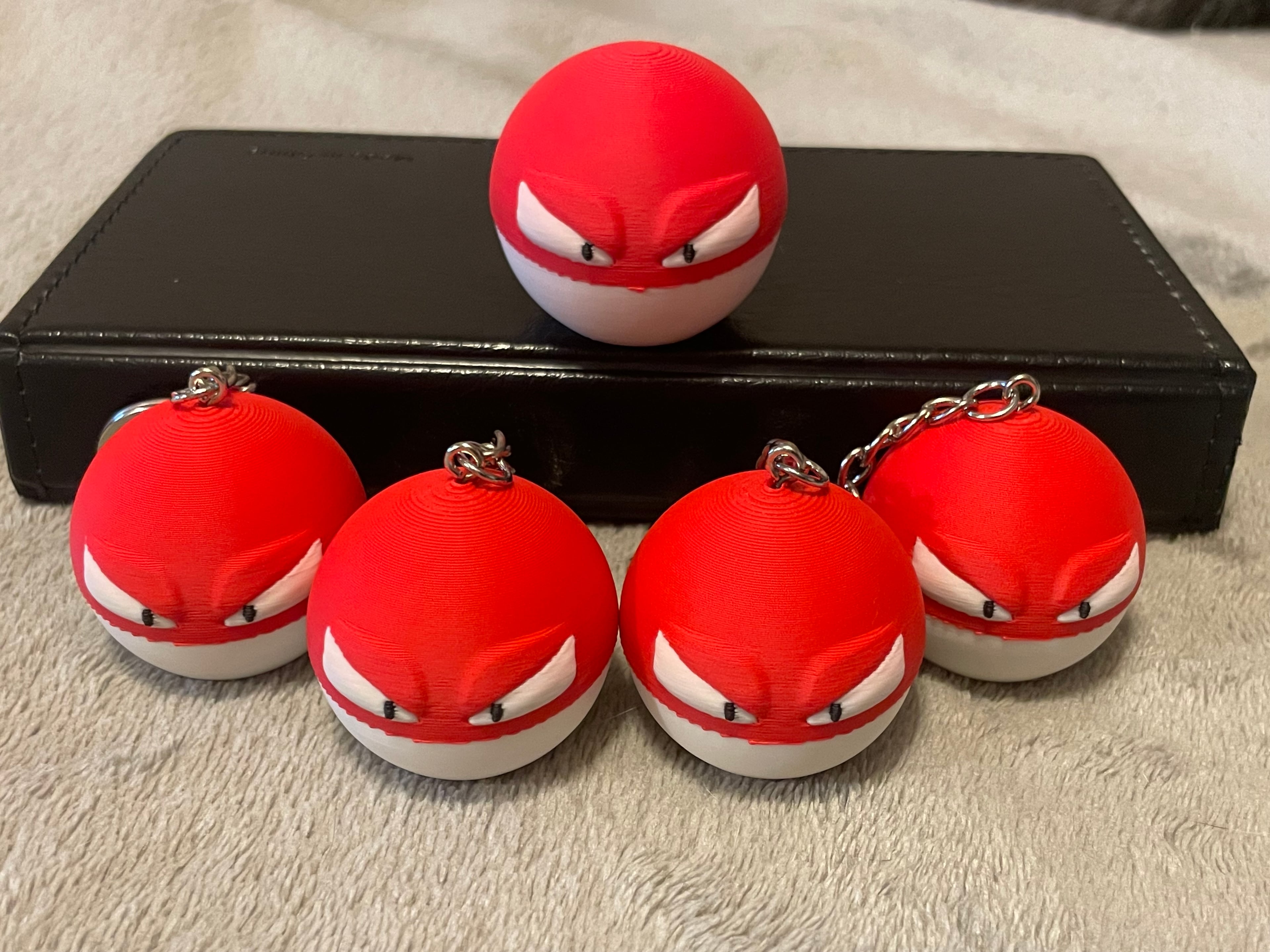 Reduced scale to be 1.5in tall for keychain size and better scale to Electrode. Still some minor tweaks to be made for flush volumes but came out great