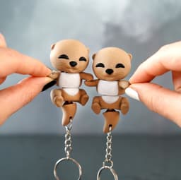 Baby Flexi Otters Magnetic Hand-Holding Companion 3d model