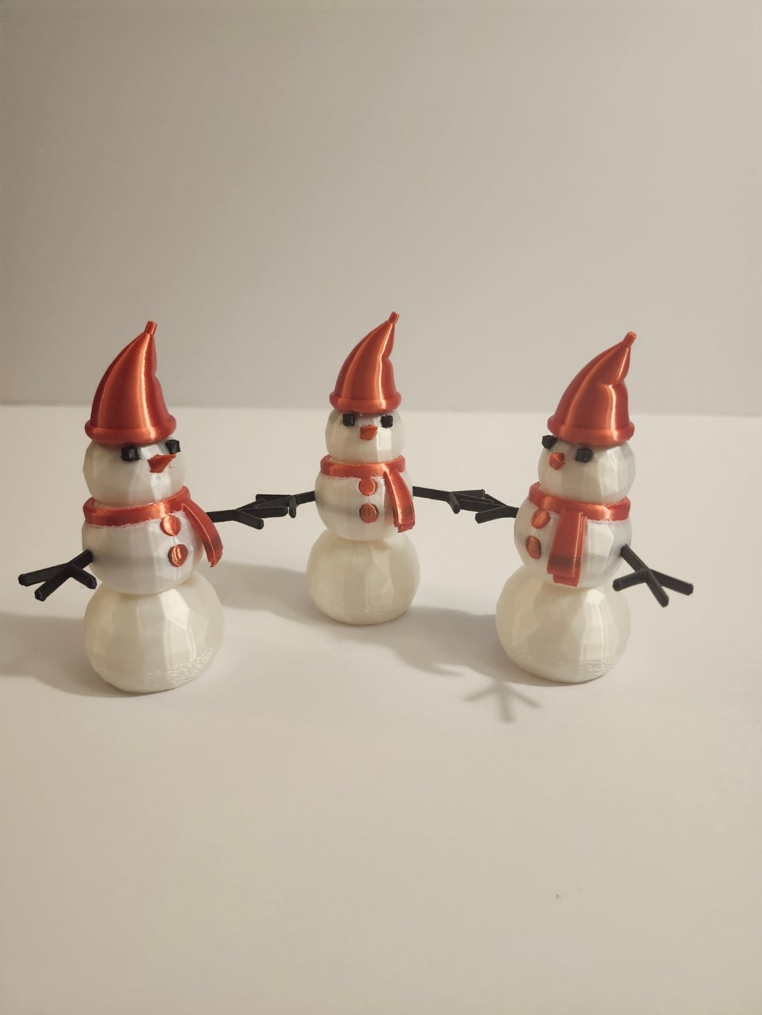 (IndyLLD on Twitch) Traditional snowmen with scarf, stocking cap, and arms.