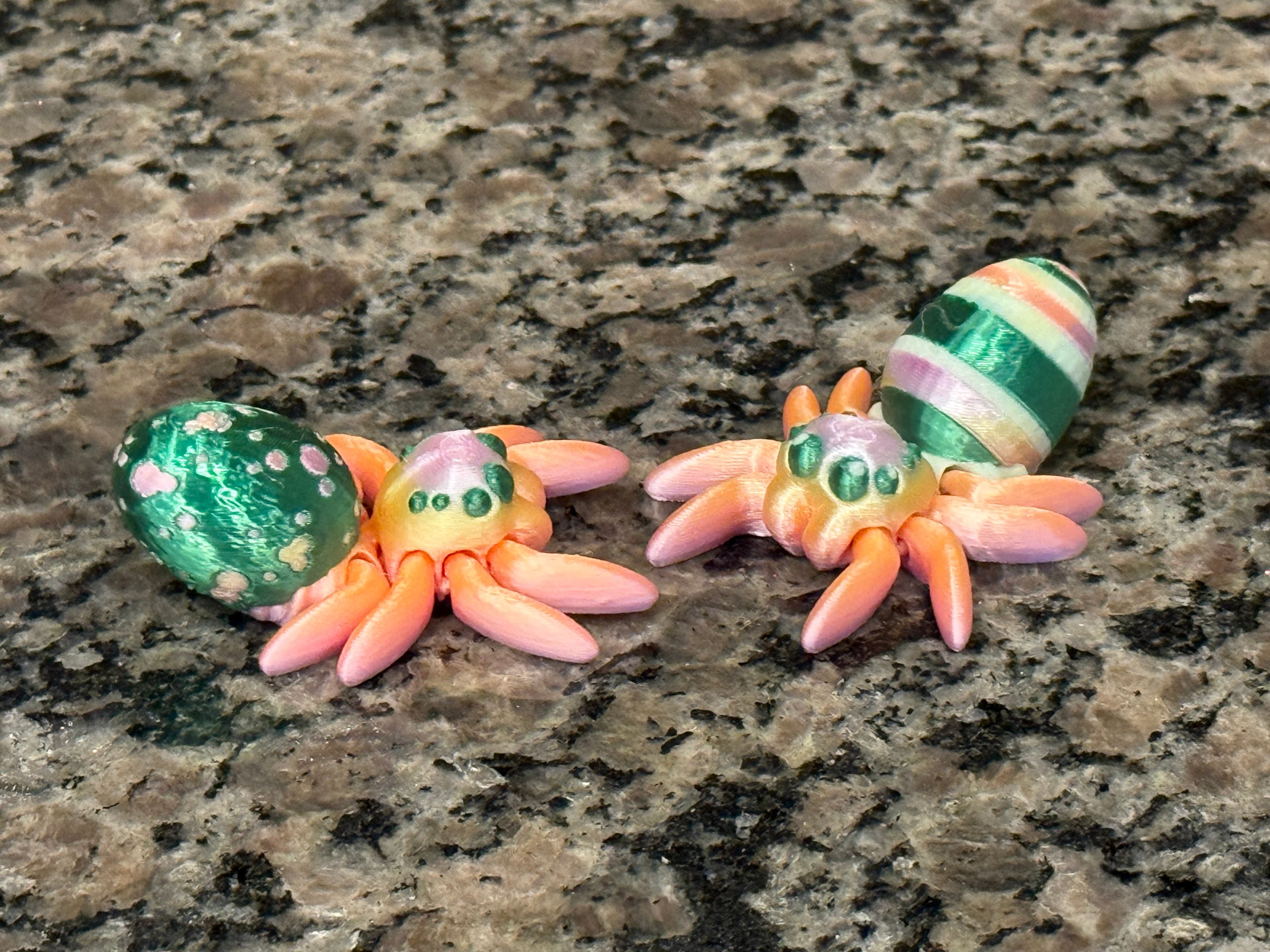 tiny egg spiders, in Ziro silk Sweet personality and HP 3DF PLA+ silk glitter Green.