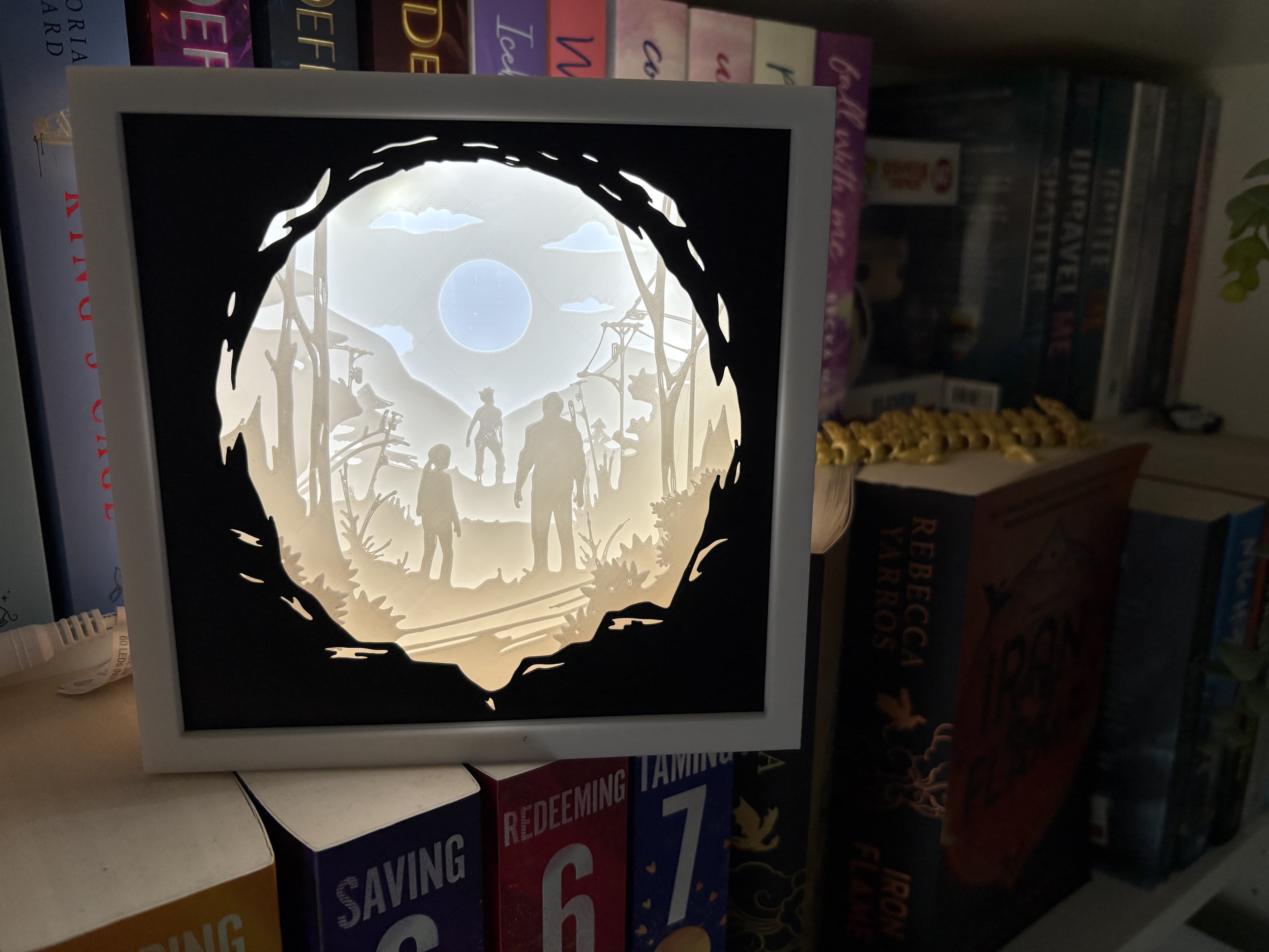 Printed this for my daughter. Looks great on her book shelf. She is asking for a Fourth Wing one now... As for the print. everything went together well and printed without issues. Only feedback is the outer box should be printed a little bigger. It is very tight to get on and I may never get it back off again.