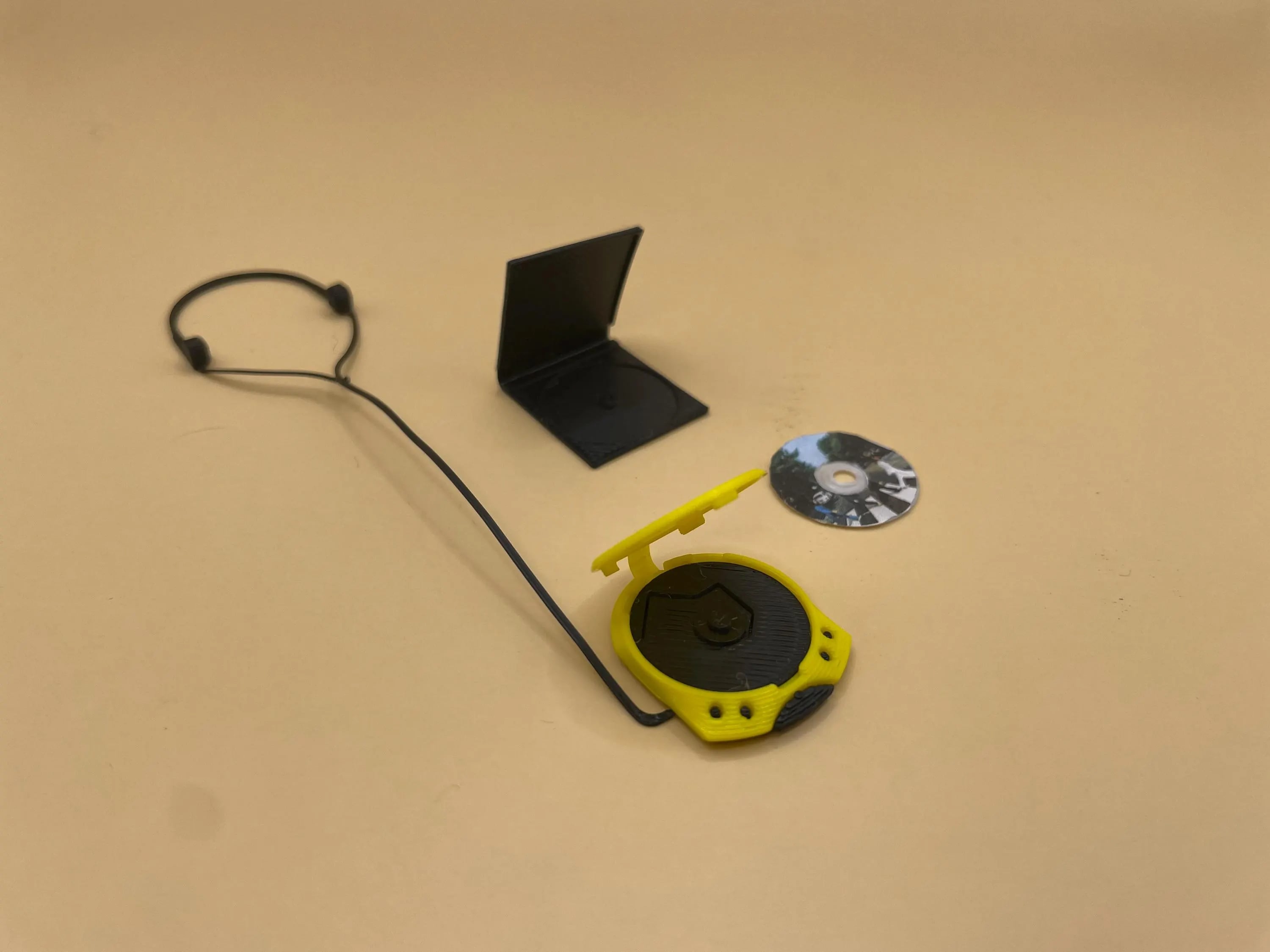 Miniature CD Player Set: 1/6 Scale Walkman, Headphones, CD - 3D Printing STL File 3d model