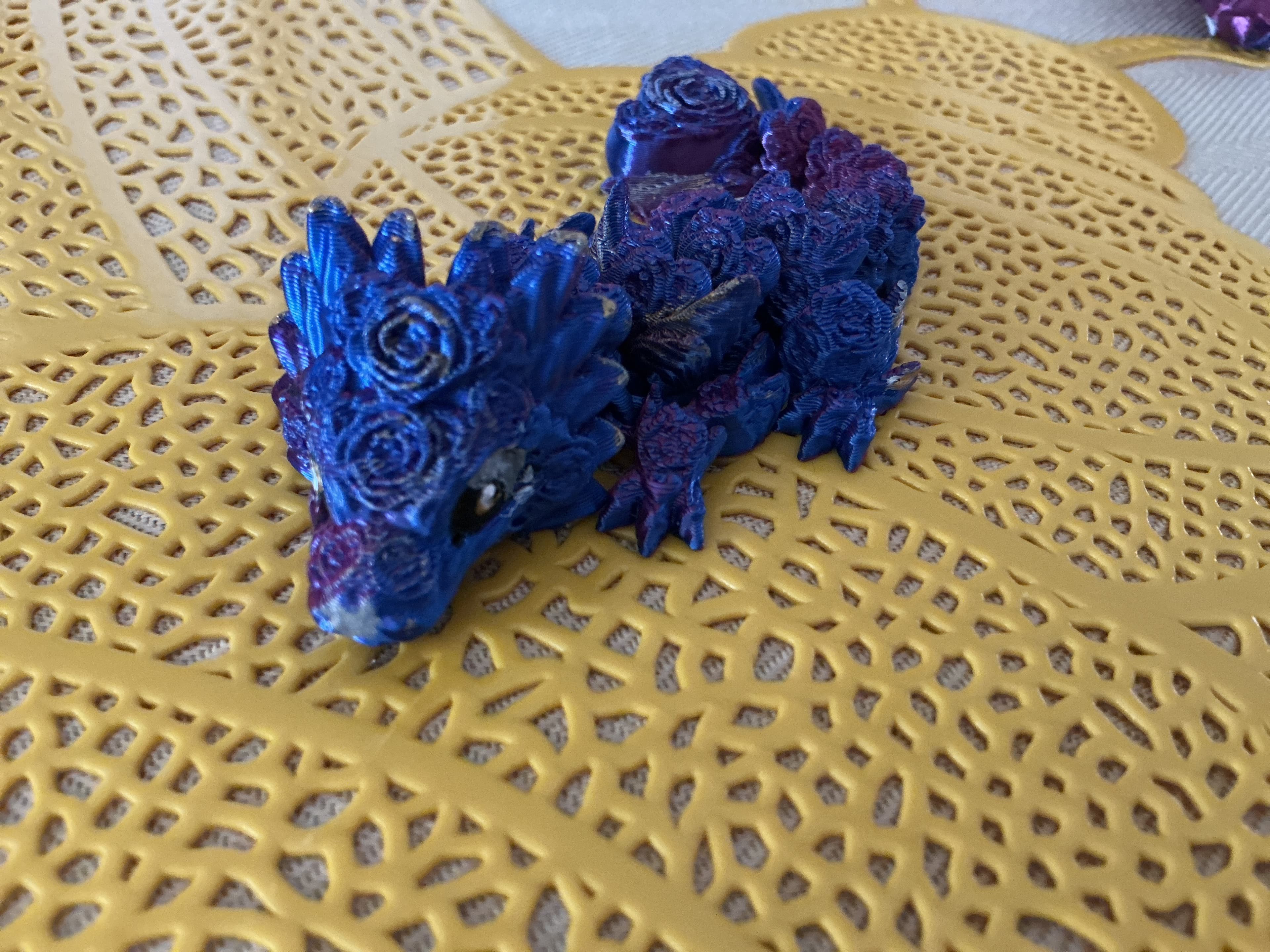 Cute little baby I printed with blue and pink PLA silk.
She turned out gorgeous, I painted her to match the adult rose dragon.
Thanks, CinderWing!