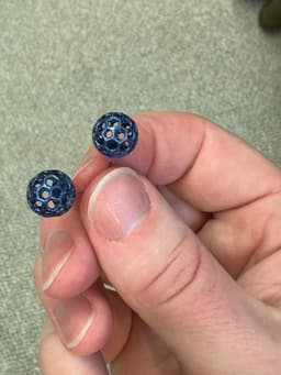 These turned out great! I would recommend turning them with the earring base toward the build plate to reduce divots from the support interface being visible on the surface of the sphere. 3d model