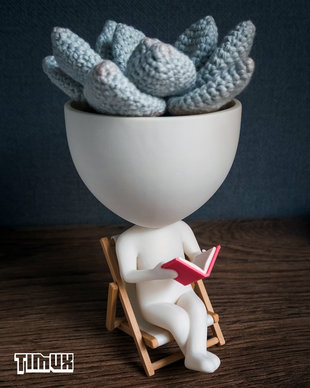 ROBERT PLANT READING ON A DECK CHAIR 3d model