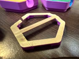I printed it on its end. And it mostly worked. Removing one of the sacrificial supports split the edge pretty cleanly. But I'm not disappointed in the result. Clever idea! 3d model