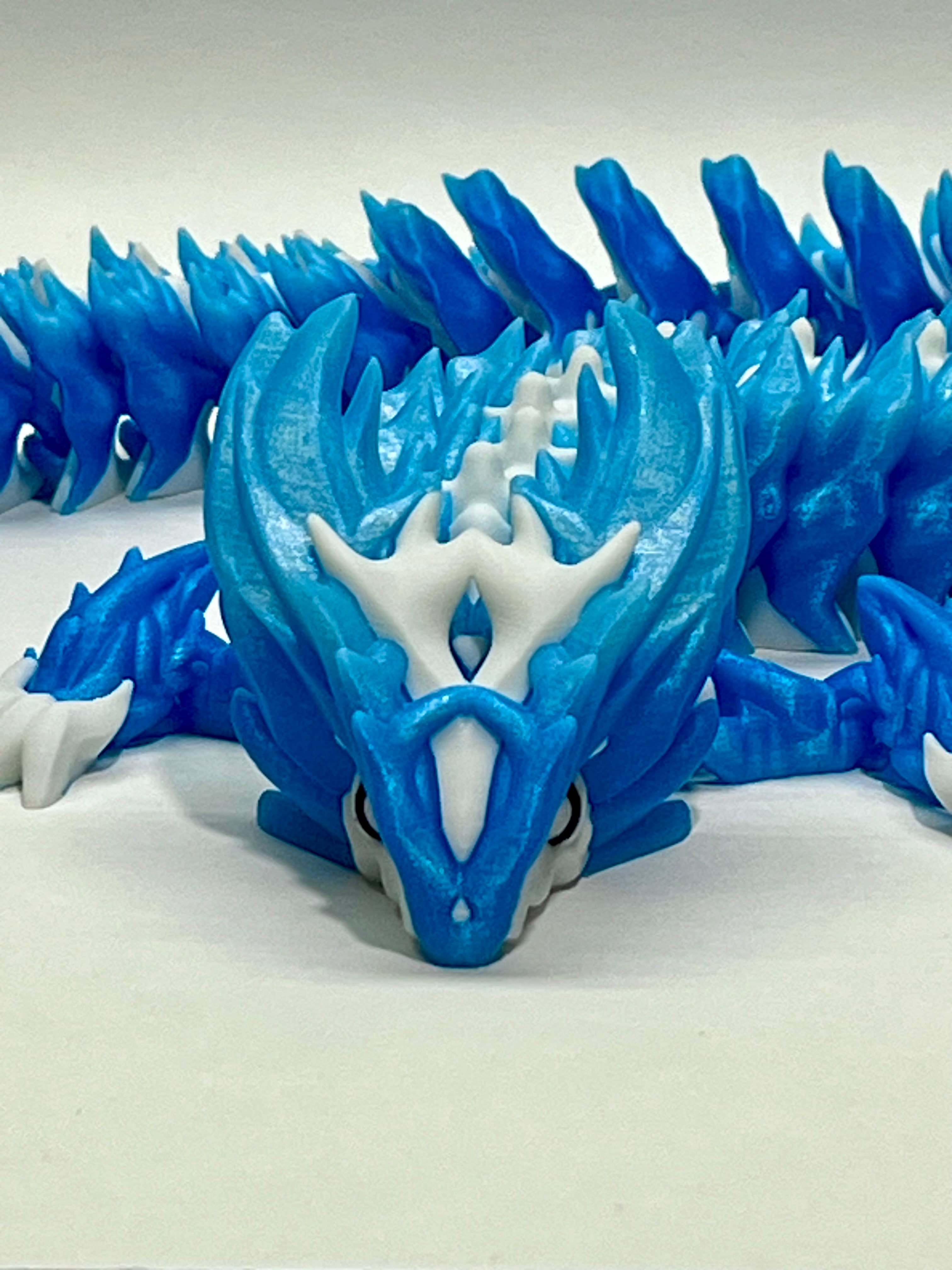 Beautiful design and print! Used Sunlu white and black, and Cookiecad elixir blue ombre PLA.