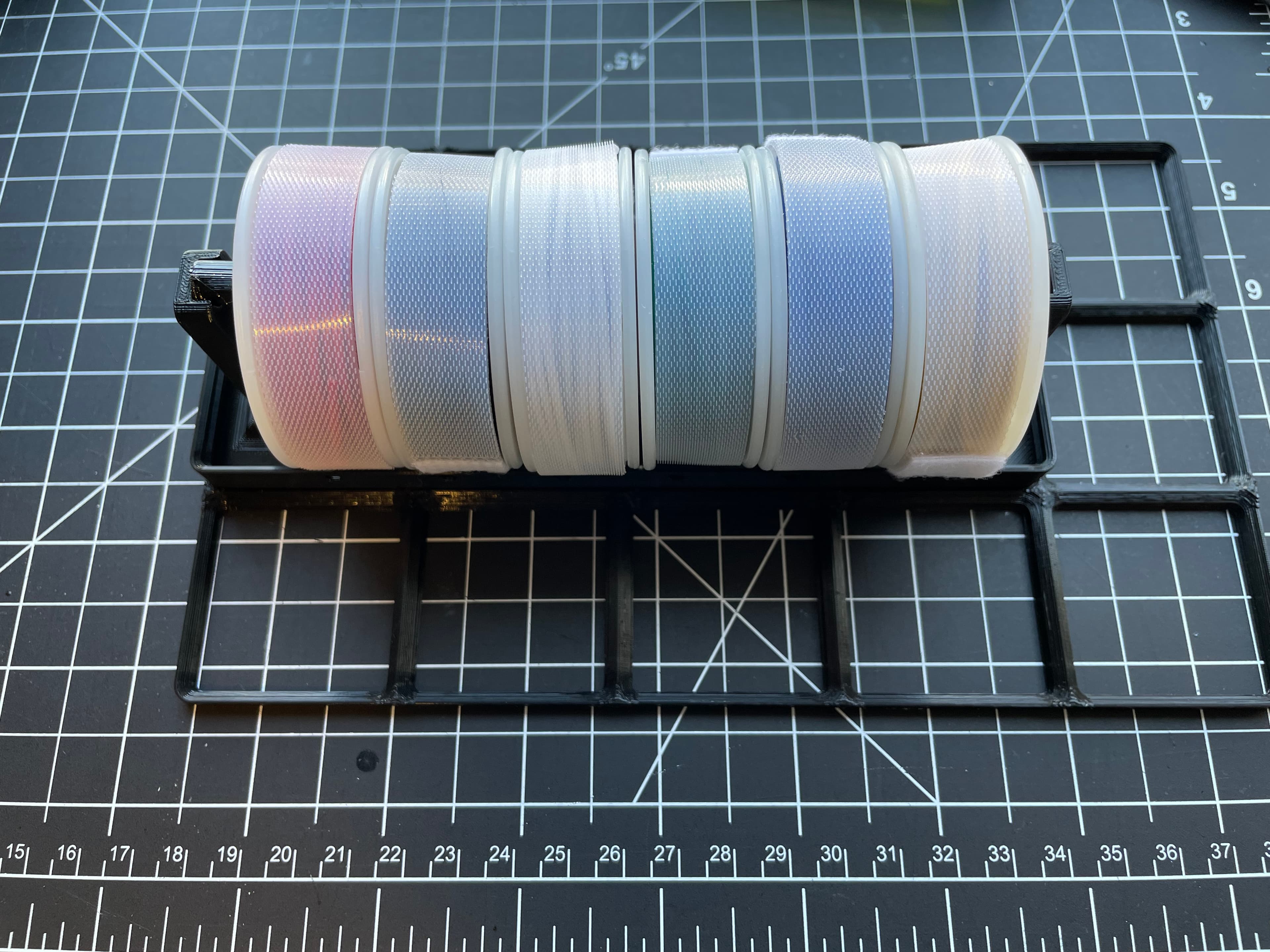 Great holder. I didn't have a rod so I just modeled one and printed it in PETG