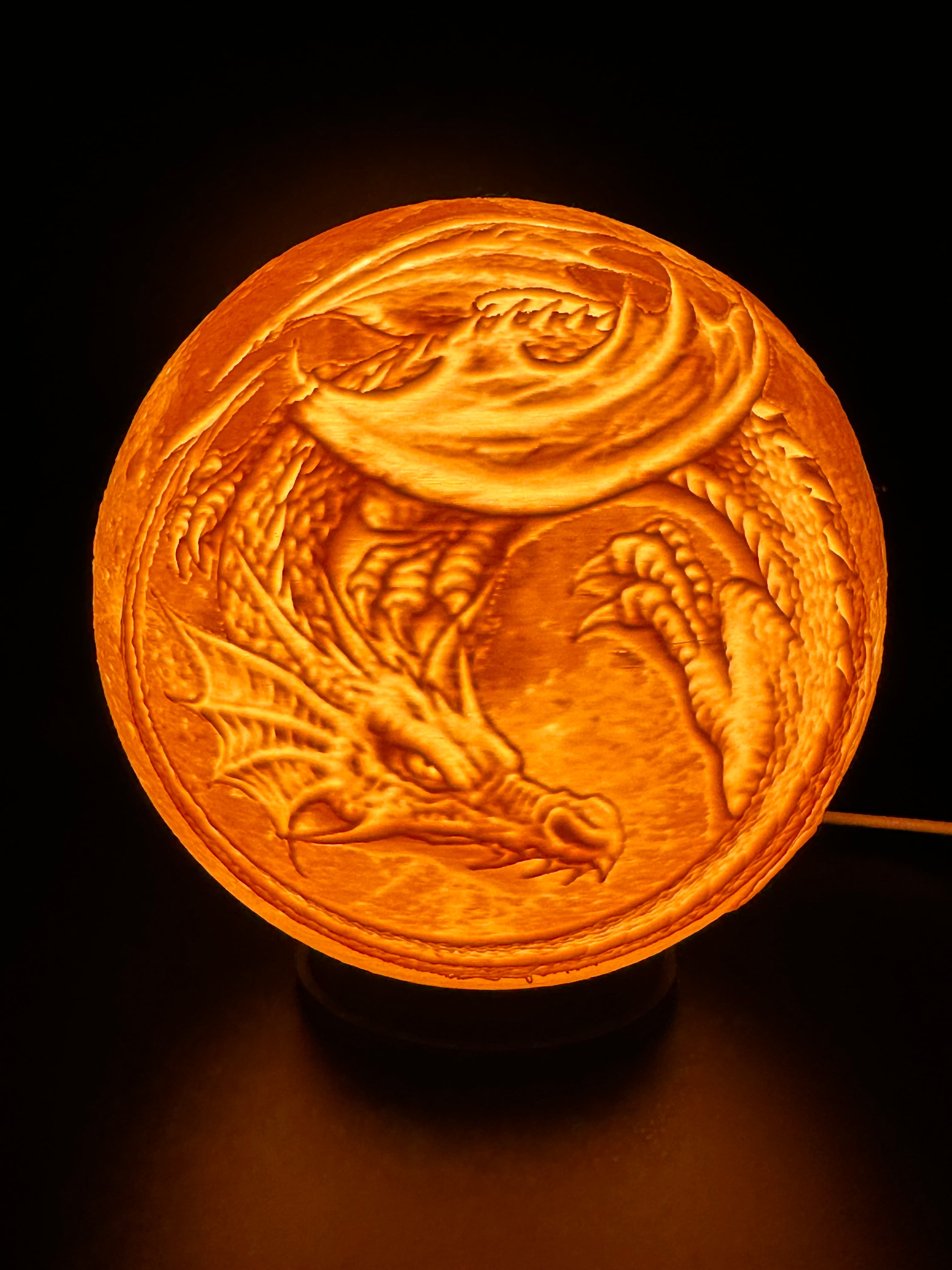 Printed in bambu beige and black filament. Used the light kit from bambu and also a puck style remote controlled lamp light to add more lighted color effects