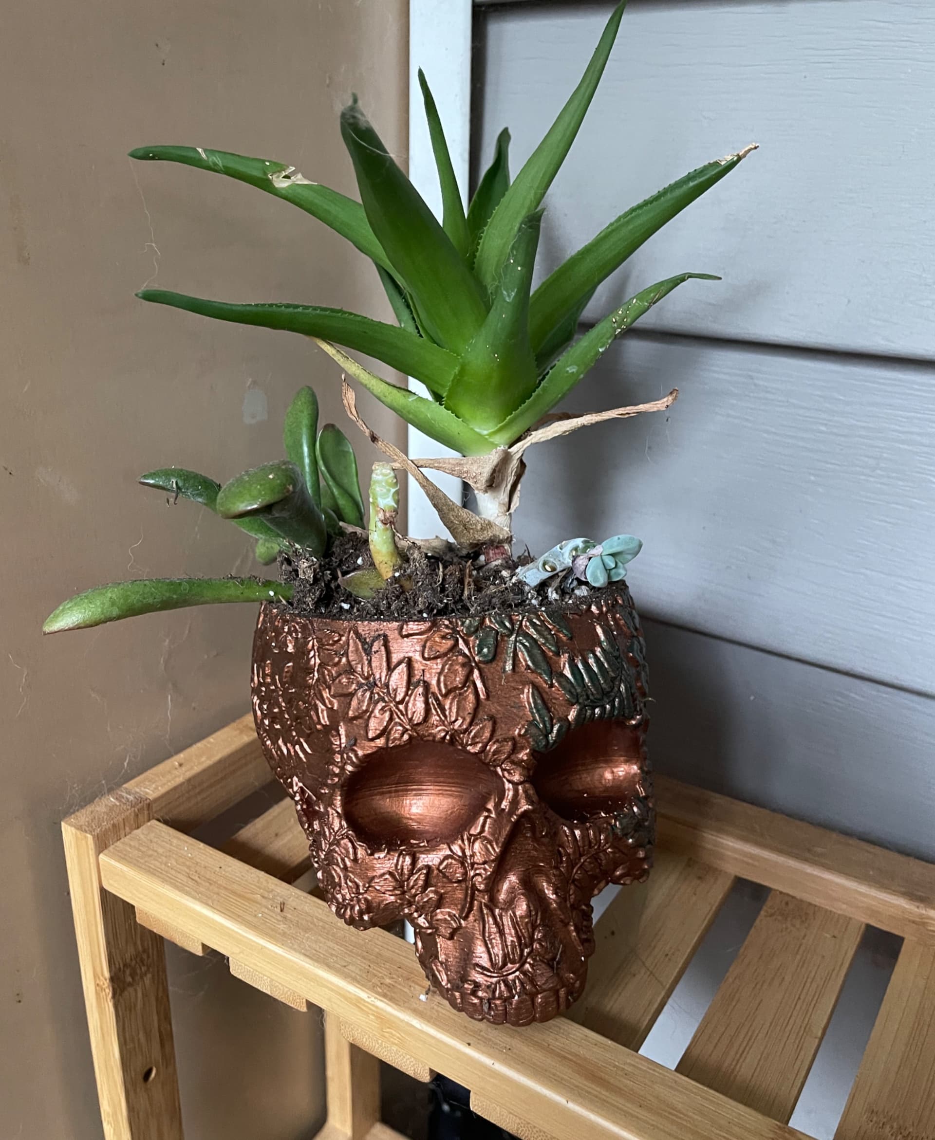 Coated in a copper-based paint so that it oxidizes as itโs exposed to weather ๐