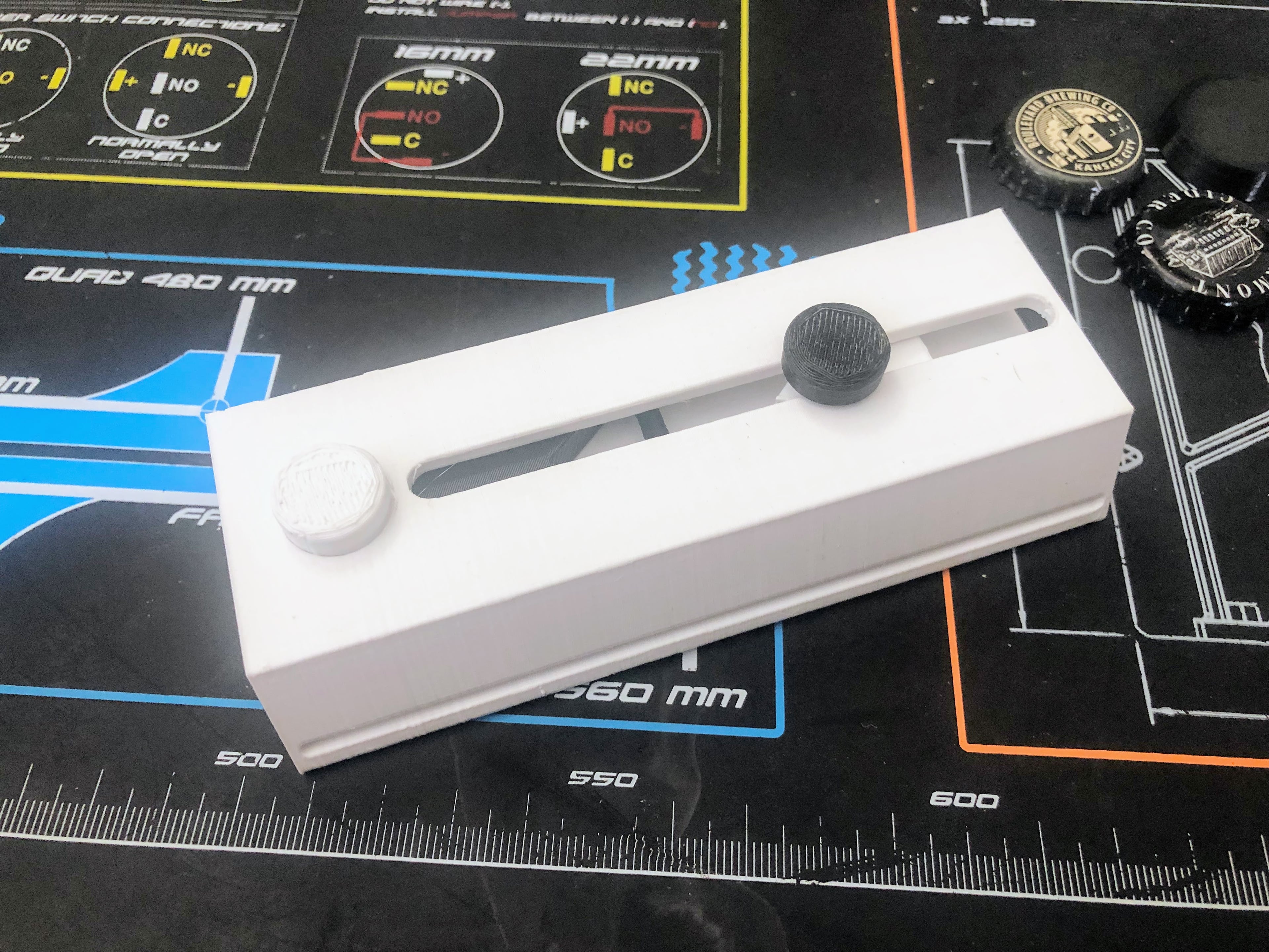 Wrist mounted bottle cap launcher - 5&6: Place "Slide" in "Body" & Screw "Peg" into "Slide" - 3d model