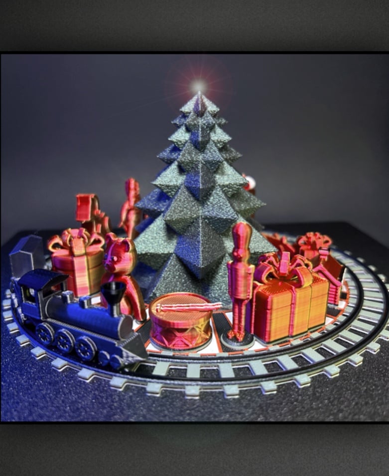 RetroMaker with Tree from LayerXLayer - https://thangs.com/designer/layerxlayer/3d-model/Christmas%20Tree%20Tea%20Light%20-%20Tall%20Version%20-%20Vase%2FSolid-963769