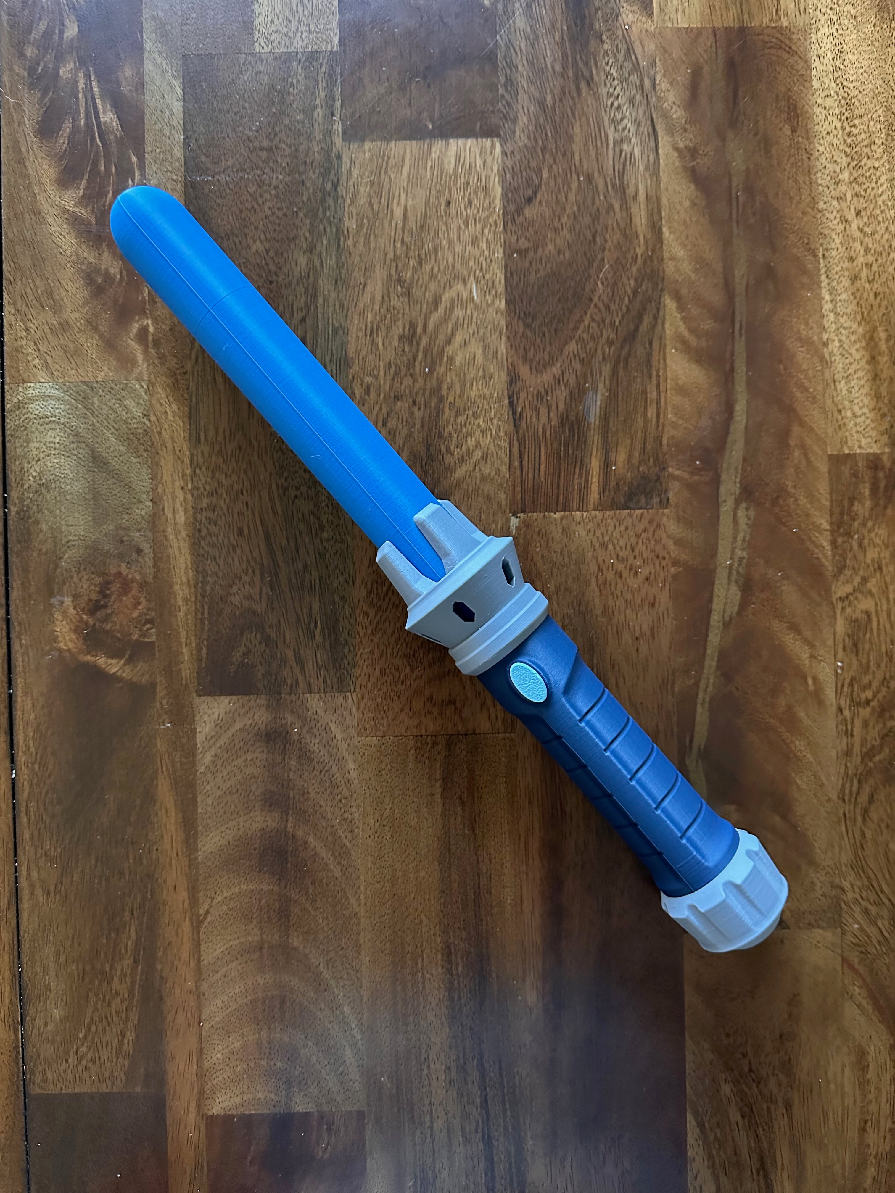 These lightsabers printed great and assemble super easily. No need for any glue or AMS and you can pick 3 different blade styles. This is the shorty.