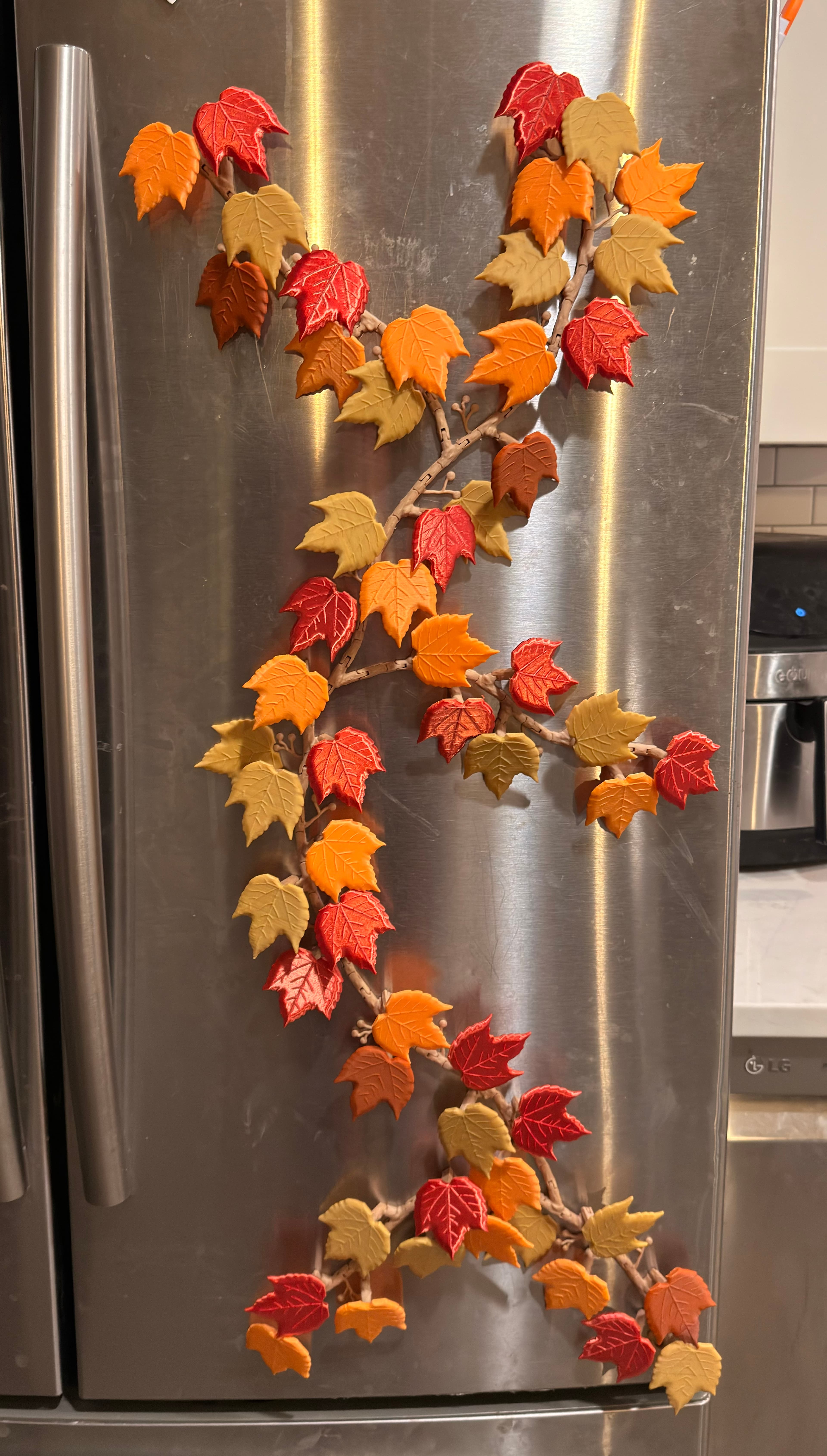 Love the vine/climbing look and how smoothly this model prints. I completely underestimted how many magnets I'd need. My red/gold silk filament had a difficult time with adhesion unless I stacked all the leaves together for printing in one row. Looking forward to other seasons! Maybe pine and holly coming up this winter?