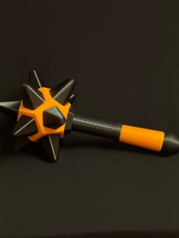 Awesome model. Spikes printed in TPU. Used Neon Orange for “ball’ and handle. 3d model