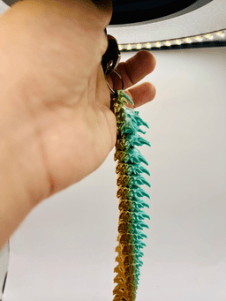 Sharphorn Articulated Flexi Keychain Dragon 3d model