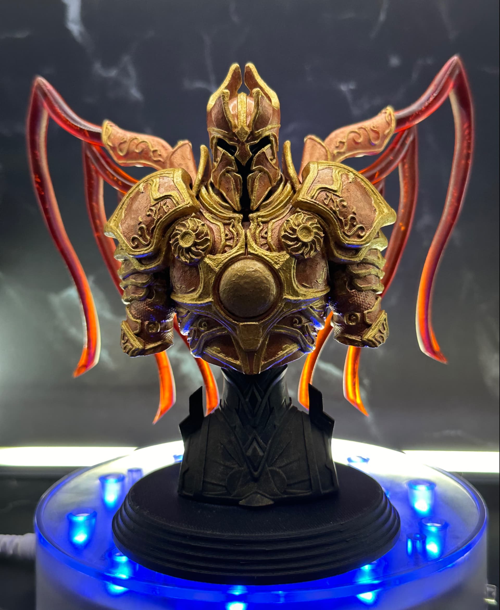 Printed in Resione clear resin and painted after with alcohol inks for the wings and regular resin for the torso and base.