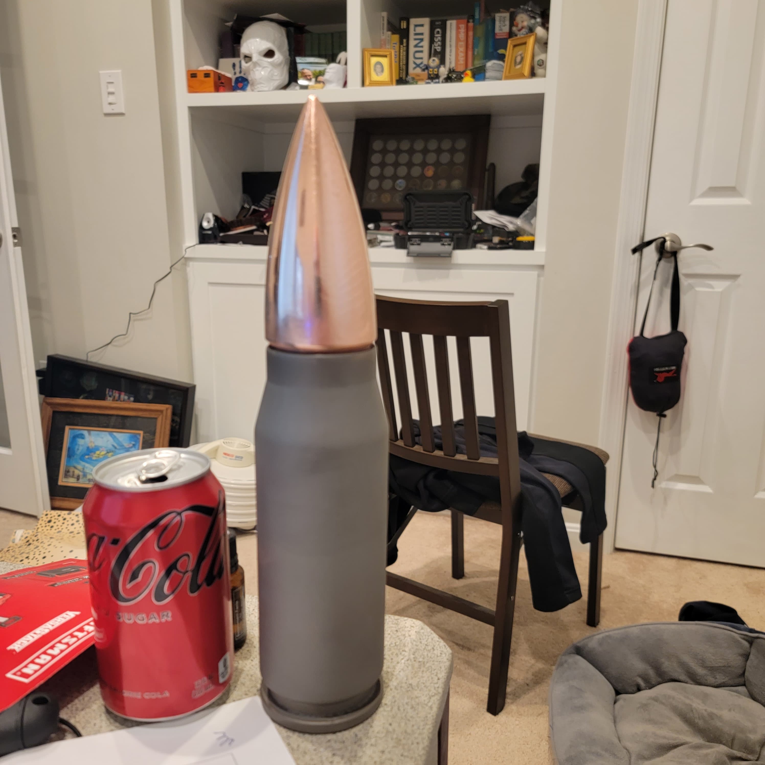 Printed with an ender 3 pro, then painted in a nickel spray paint. Finished with a copper electroplating for the bullet. I got a couple of thin spots on the electroplating, but overall...it think it came out cool.