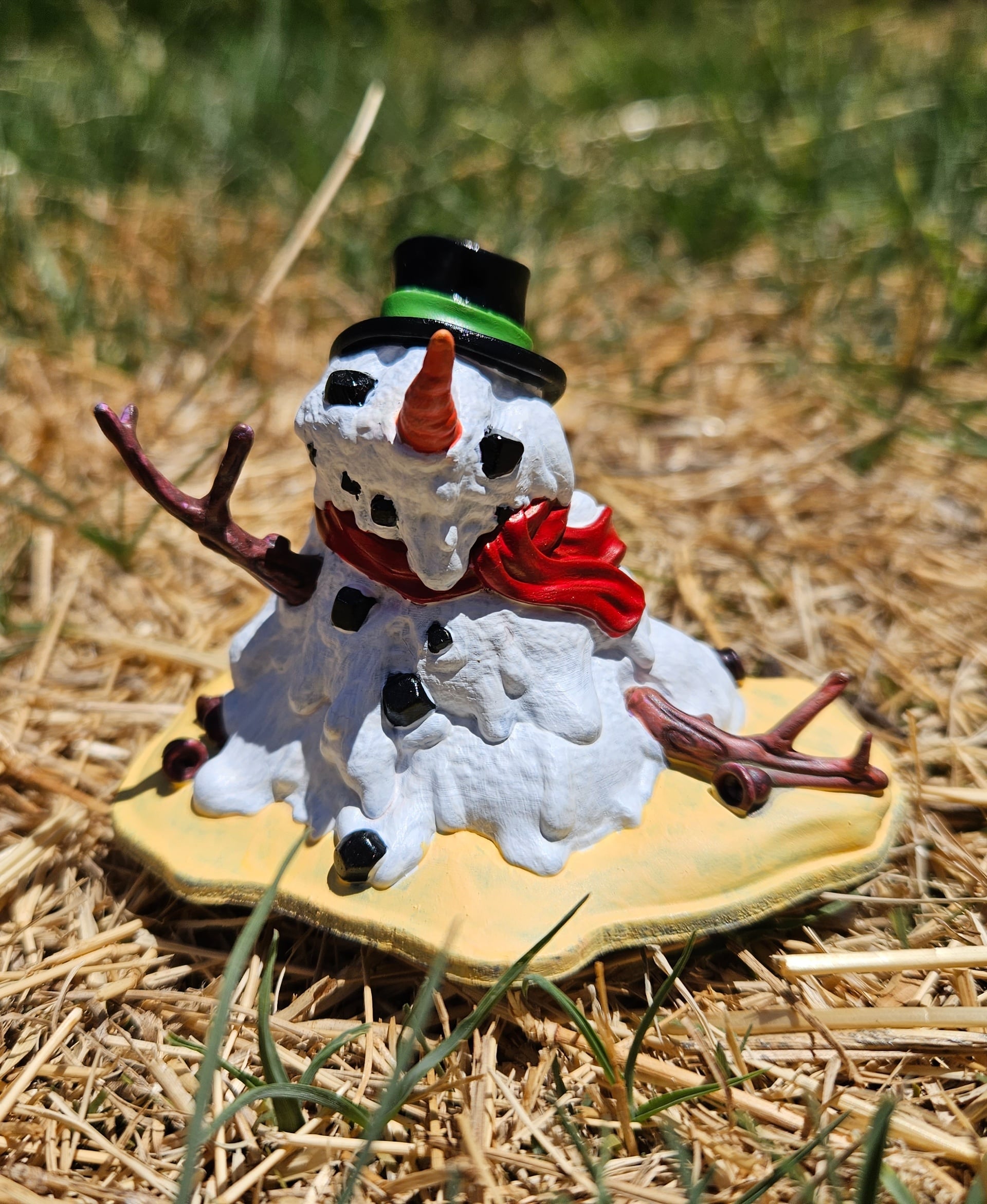 Winter's a good time to stay in and cuddle
But put me in summer and I'll be a ? happy snowman!