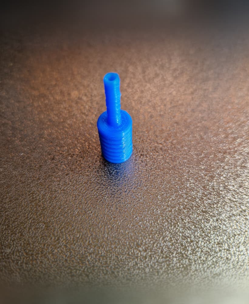 Filament holder plug for 3D filament dryer box 3d model